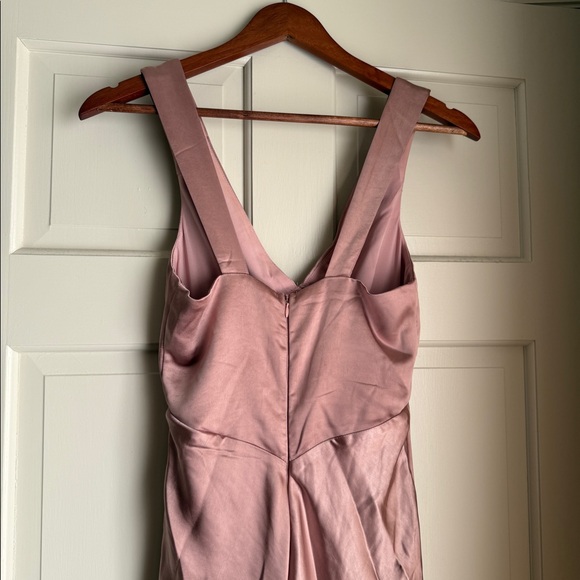 Dusty pink satin maxi dress with v neck and back. Dusty pink satin maxi dress with v neck and back.